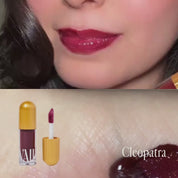 top shows Cleopatra lip gloss applied on the lips and bottom shows it being swatched on the palm of hand